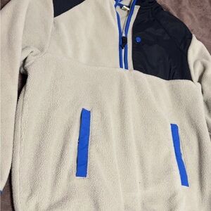 Neutral Fleece Pullover with Blue Accents